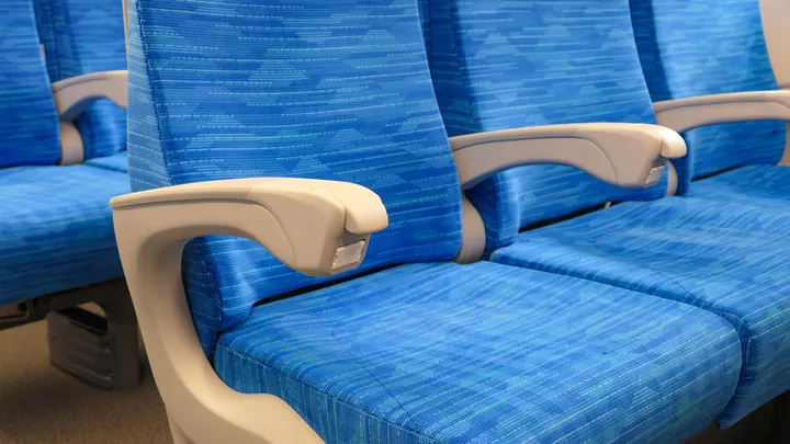 The outlet in the armrest of an ordinary-class seat on an N700S shinkansen