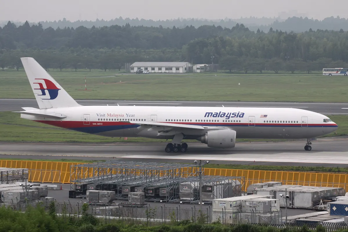 A Malaysia Airlines Boeing 777 aircraft taxiing at Narita International Airport in Tokyo