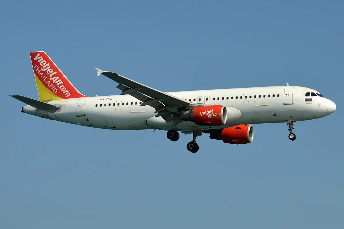 Thai Vietjet Air Airbus A320 aircraft in flight with its landing gear down