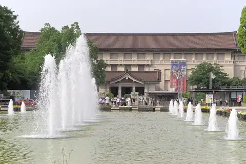 Fountains in Ueno Park with the Tokyo National Museum building in the background