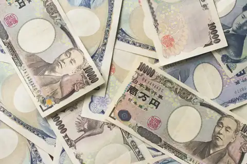 A pile of Japanese 10,000 yen banknotes