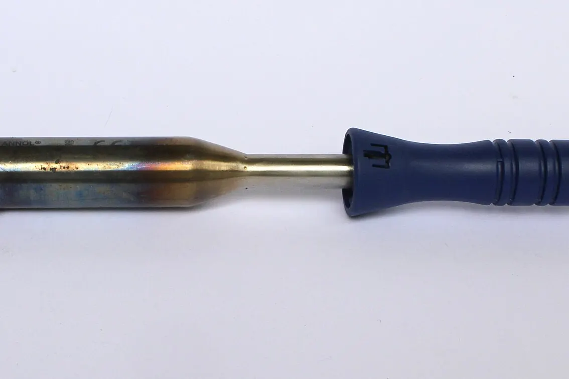 Electric soldering iron with a blue grip on a white background