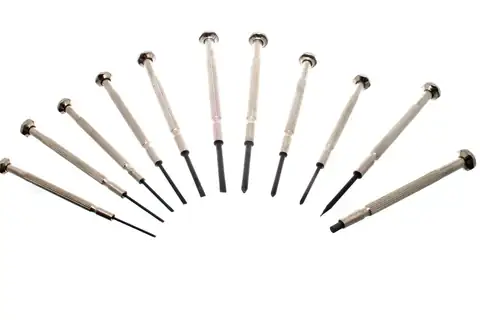 Several small precision screwdrivers fanned out on a white background