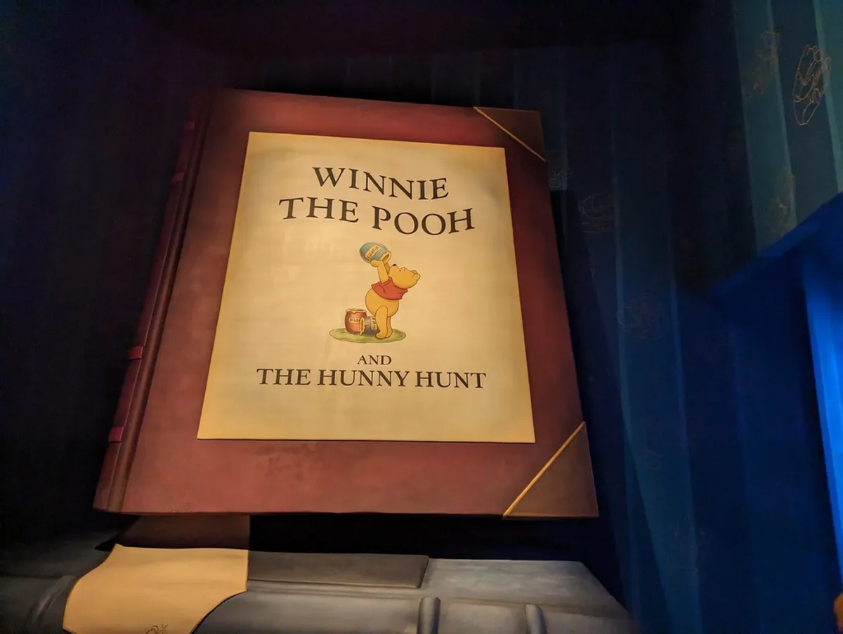 Large 'Winnie the Pooh and the Hunny Hunt' storybook in the ride queue