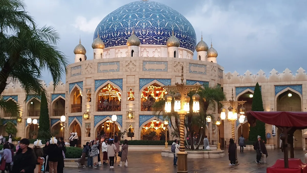 Arabian Coast palace with its blue dome at dusk