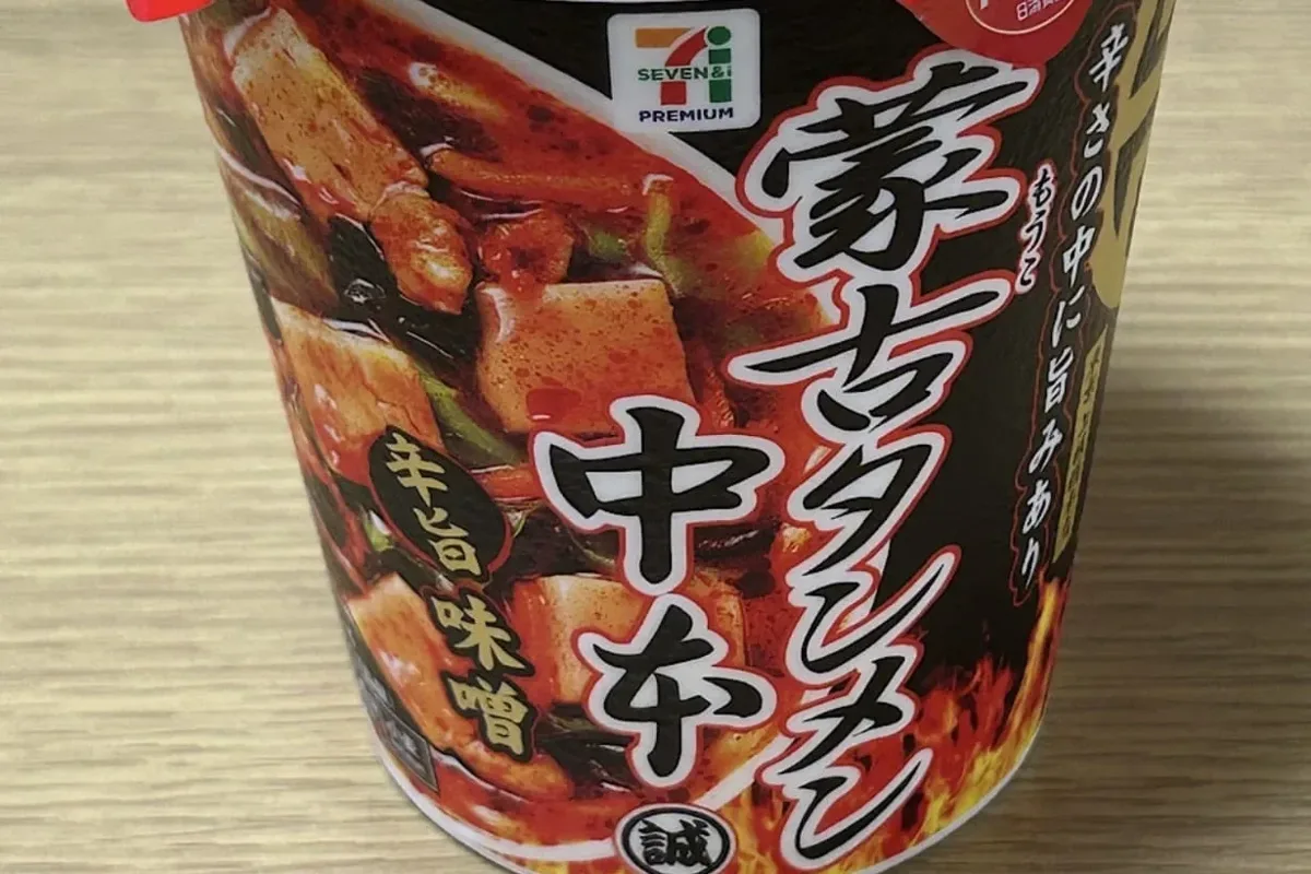 A 7-Eleven Seven Premium Mouko Tanmen Nakamoto spicy miso cup noodle on a table in Tokyo