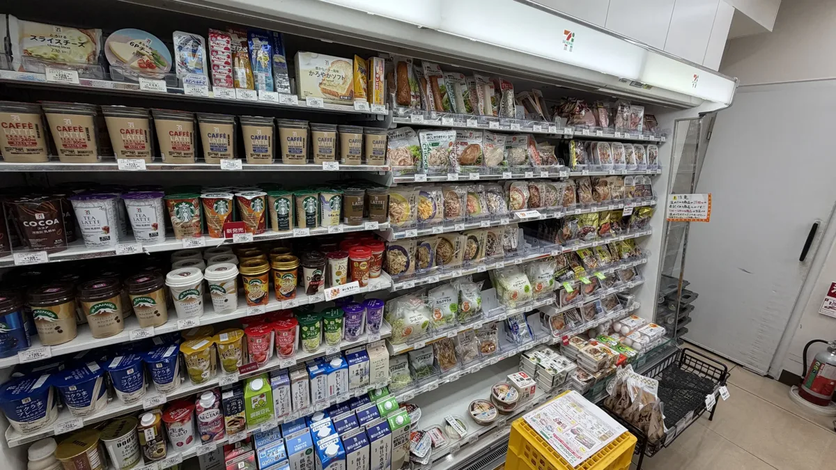 Shelves of snacks, instant noodles and drinks inside a 7-Eleven in Tokyo