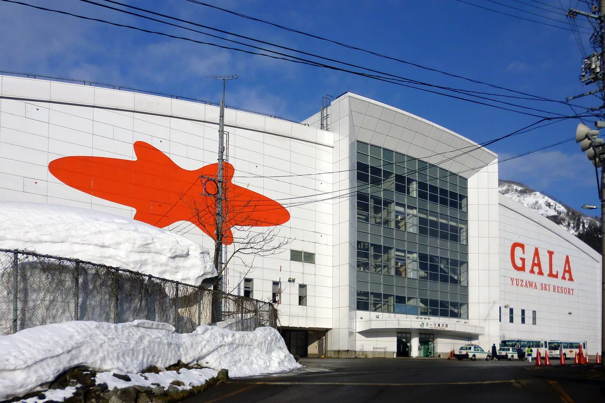 GALA Yuzawa Snow Resort building in Niigata with deep snow piled up outside in winter