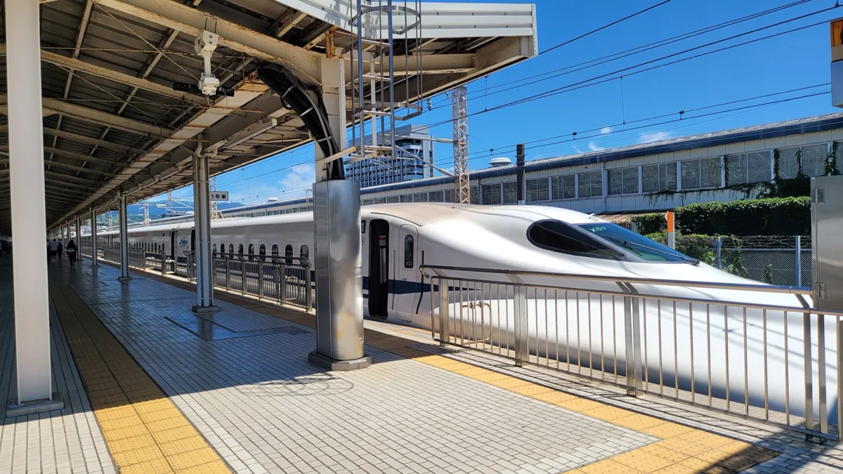 A Tokaido Shinkansen N700 series train at the platform of Mishima Station in 2025