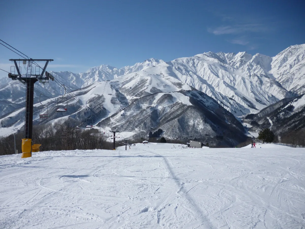 Snowy Happo-one in Hakuba, Nagano, seen from a ski slope and chairlift at Hakuba Iwatake in February