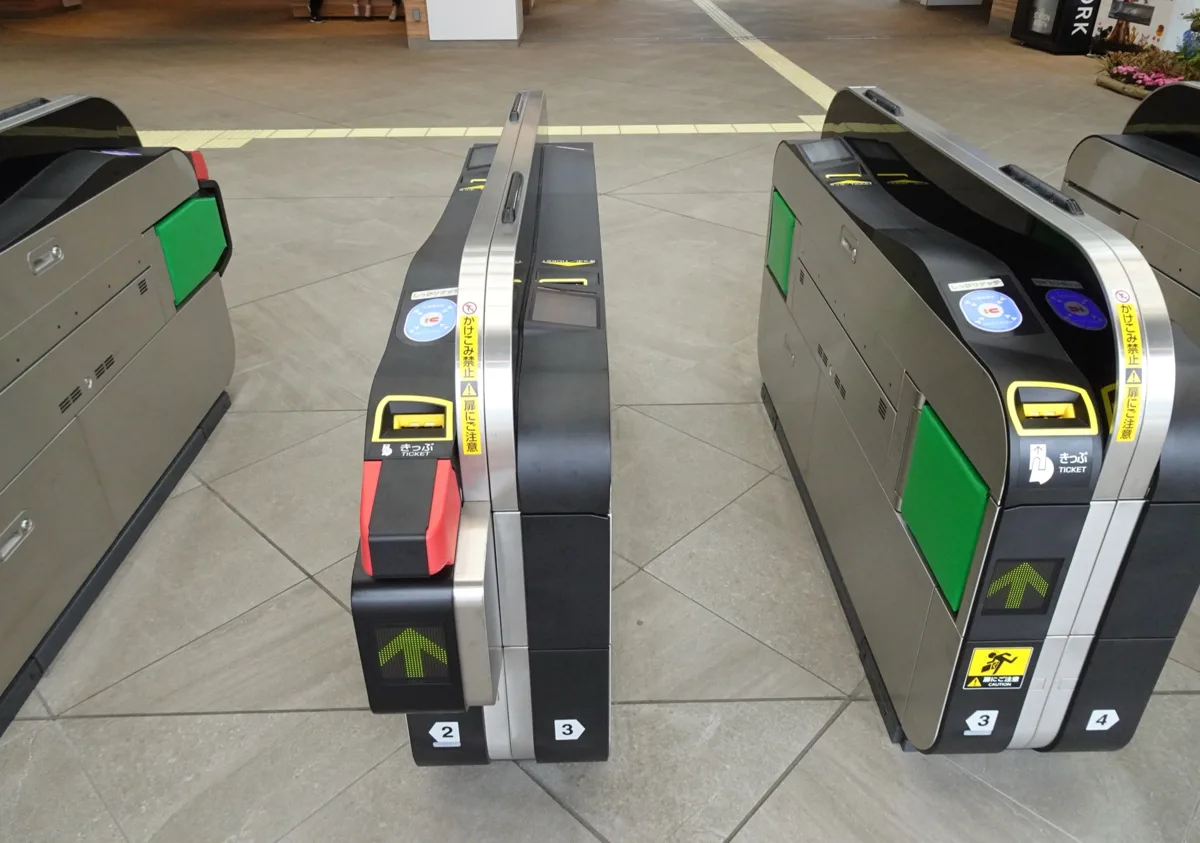 A new JR East ticket gate with an IC card reader and a QR code reader by the ticket slot, at Makuhari-Toyosuna Station, in.