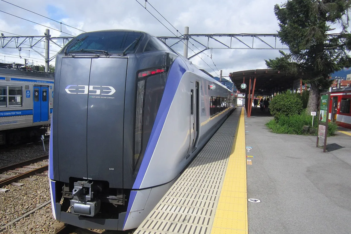 JR East E353 series Fuji Excursion limited express train stopped at a platform at Kawaguchiko Station