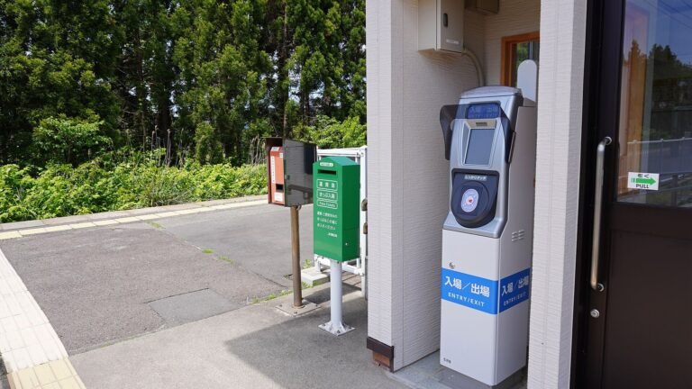 A simple automatic ticket gate with a Suica card reader outside a JR East station in Oga City, Akita Prefecture