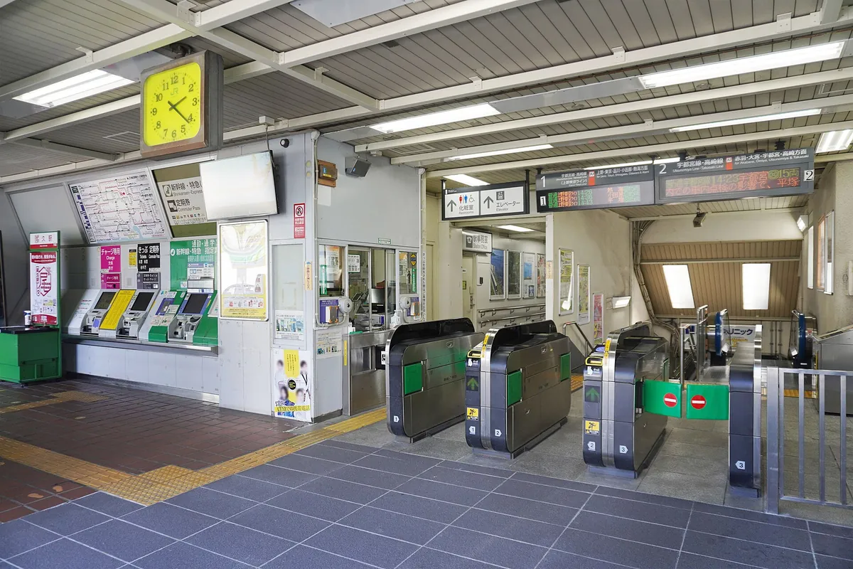 Ticket gates with IC card readers at JR Oku Station in Tokyo